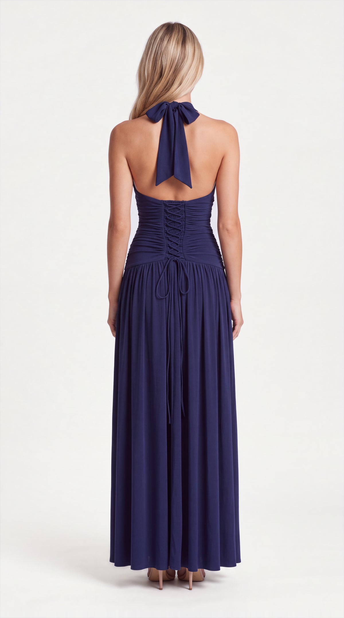 Navy blue halter ruched maxi dress for women, back view of the Colette Halter Ruched Maxi Dress – Navy Blue showing the fit and length, ELLA Toronto