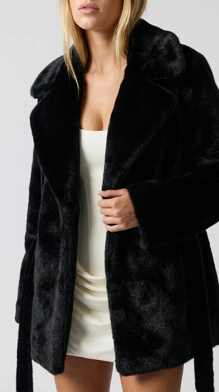 Close-up of the black Distillery Faux Fur Jacket faux fur lapel jacket showing the fabric texture and collar, ELLA Toronto
