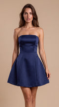 Navy blue strapless satin bell mini dress for women, the Elodie Sculpted Mini Dress – Navy Blue by ELLA Toronto, front view from head to knee showing the neckline, bodice and fit