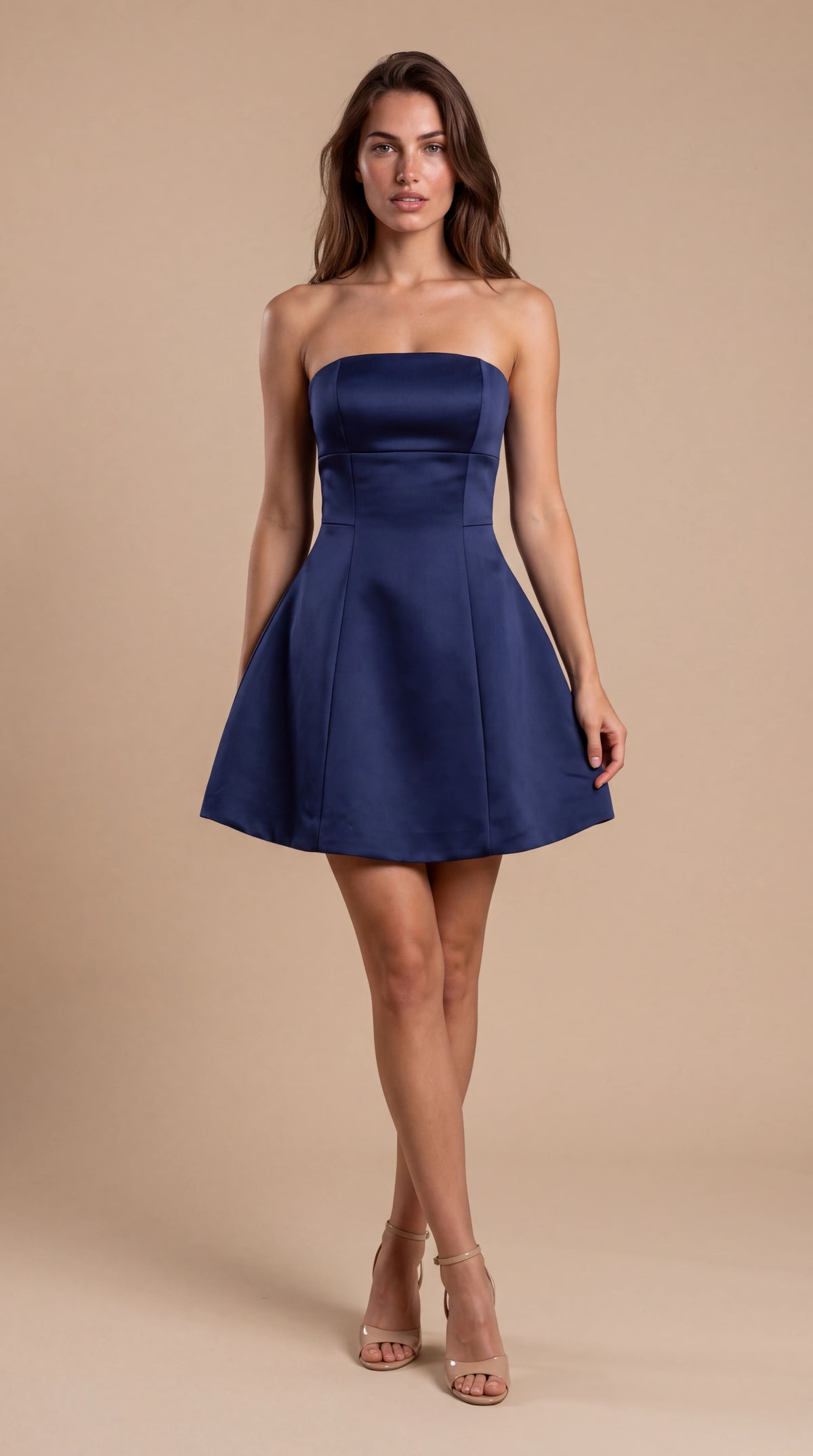 Navy blue strapless satin bell mini dress for women, front view of the Elodie Sculpted Mini Dress – Navy Blue by ELLA Toronto in a light grey studio