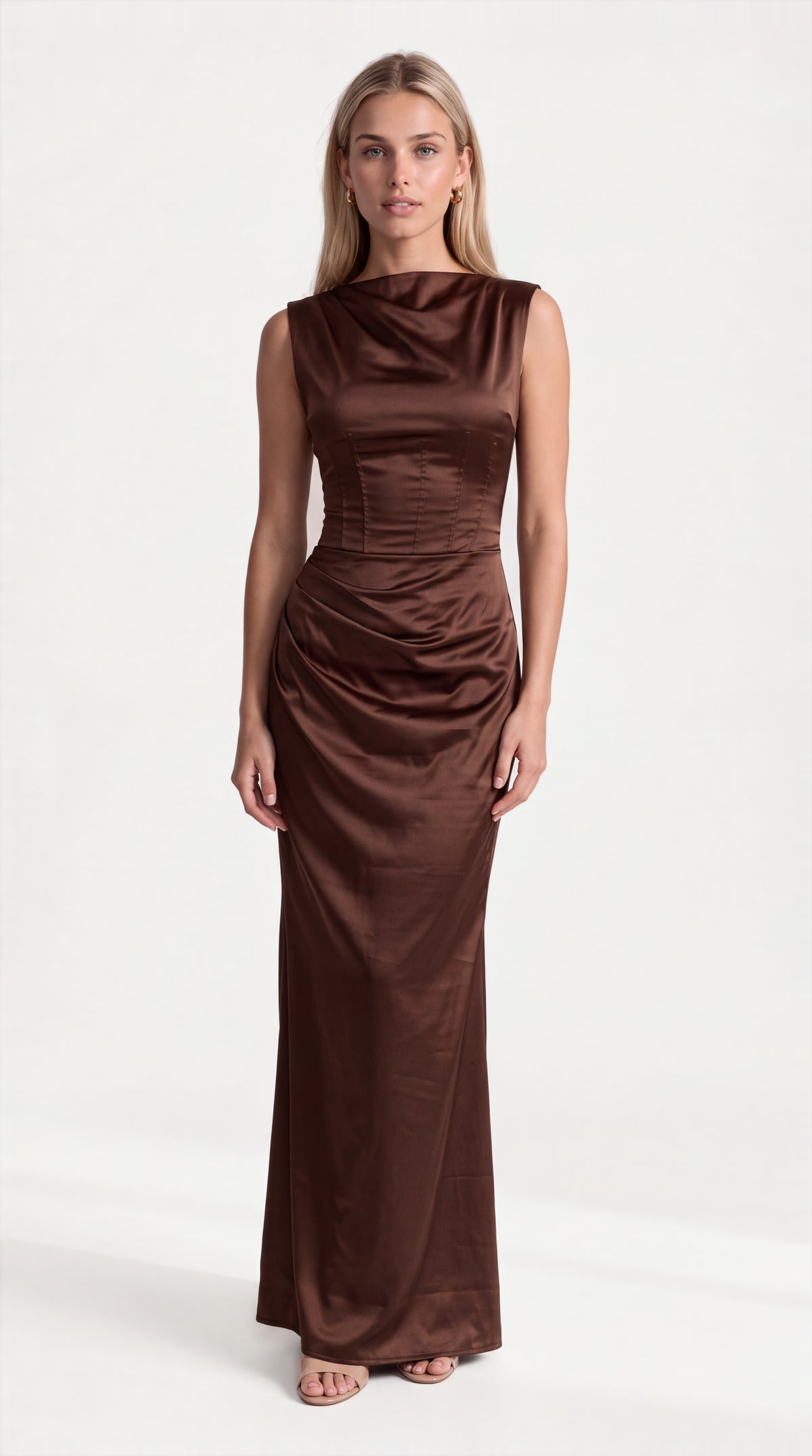 Brown satin corset maxi dress with draped neckline for women, front view of the Genevieve Satin Corset Maxi Dress – Brown by ELLA Toronto in a light grey studio