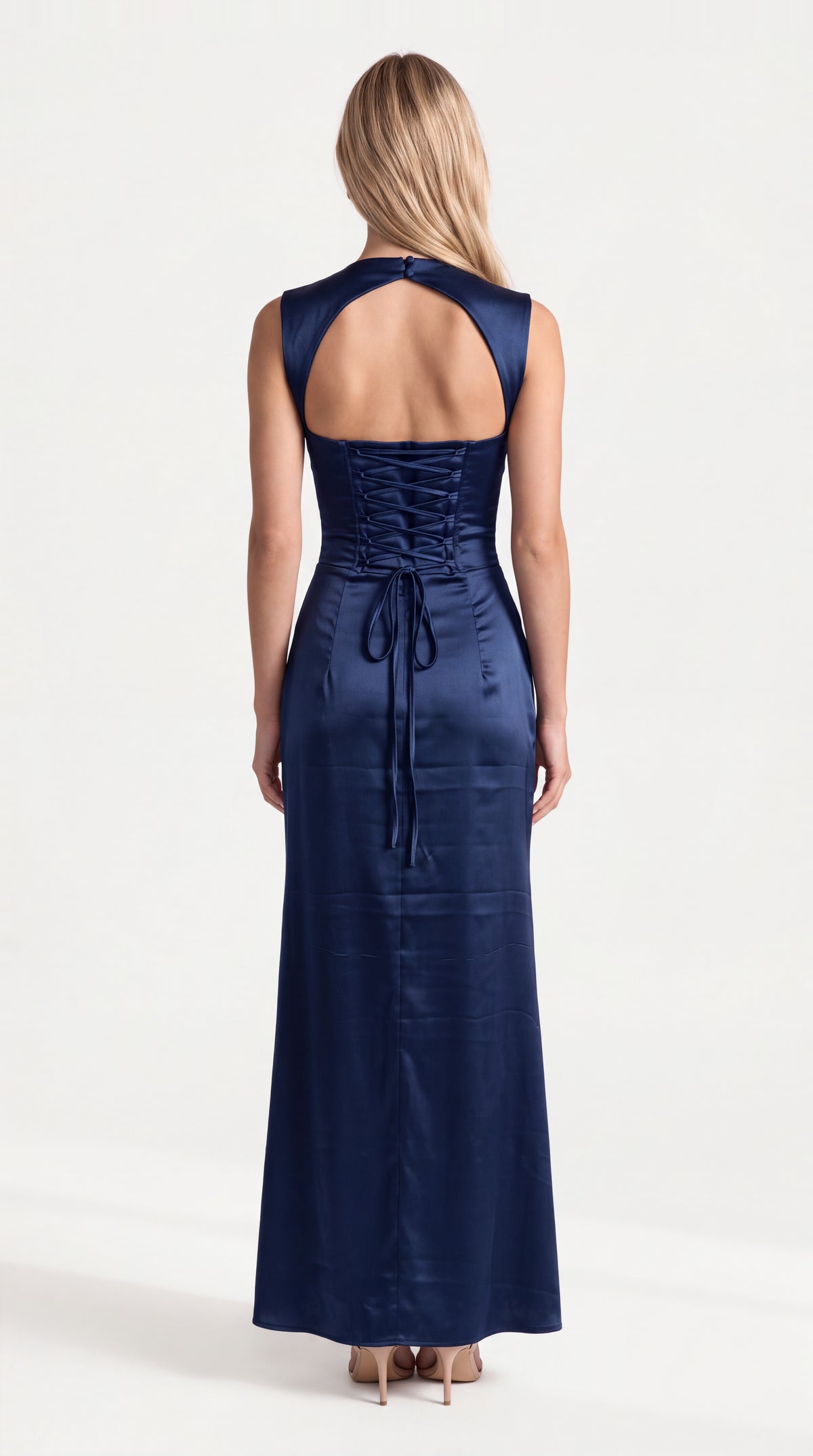 Navy blue satin corset maxi dress with draped neckline for women, back view of the Genevieve Satin Corset Maxi Dress – Navy Blue showing the fit and length, ELLA Toronto