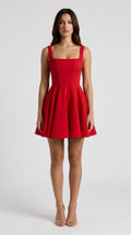 Red square neck mini dress with detachable back bow for women, front view of the Juliette Bow Mini Dress by ELLA Toronto in a light grey studio