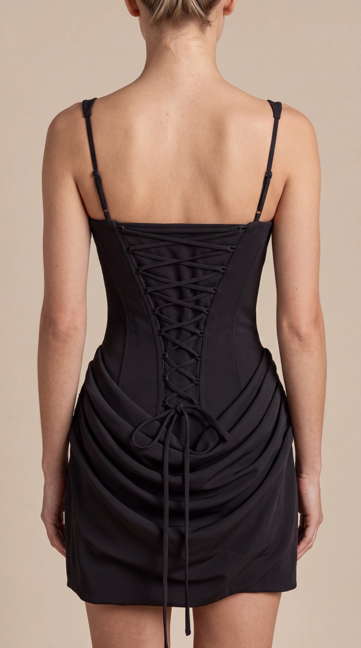 Close-up of the back of the Margaux Corset Mini Dress – Black, showing the back details, straps and fit, ELLA Toronto