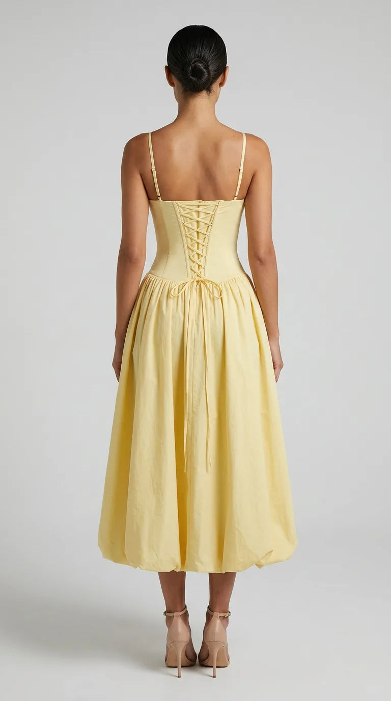Cream yellow bubble hem midi dress with ruched bodice and front slit for women, back view of the Odette Bubble Midi Dress – Cream Yellow showing the fit and length, ELLA Toronto