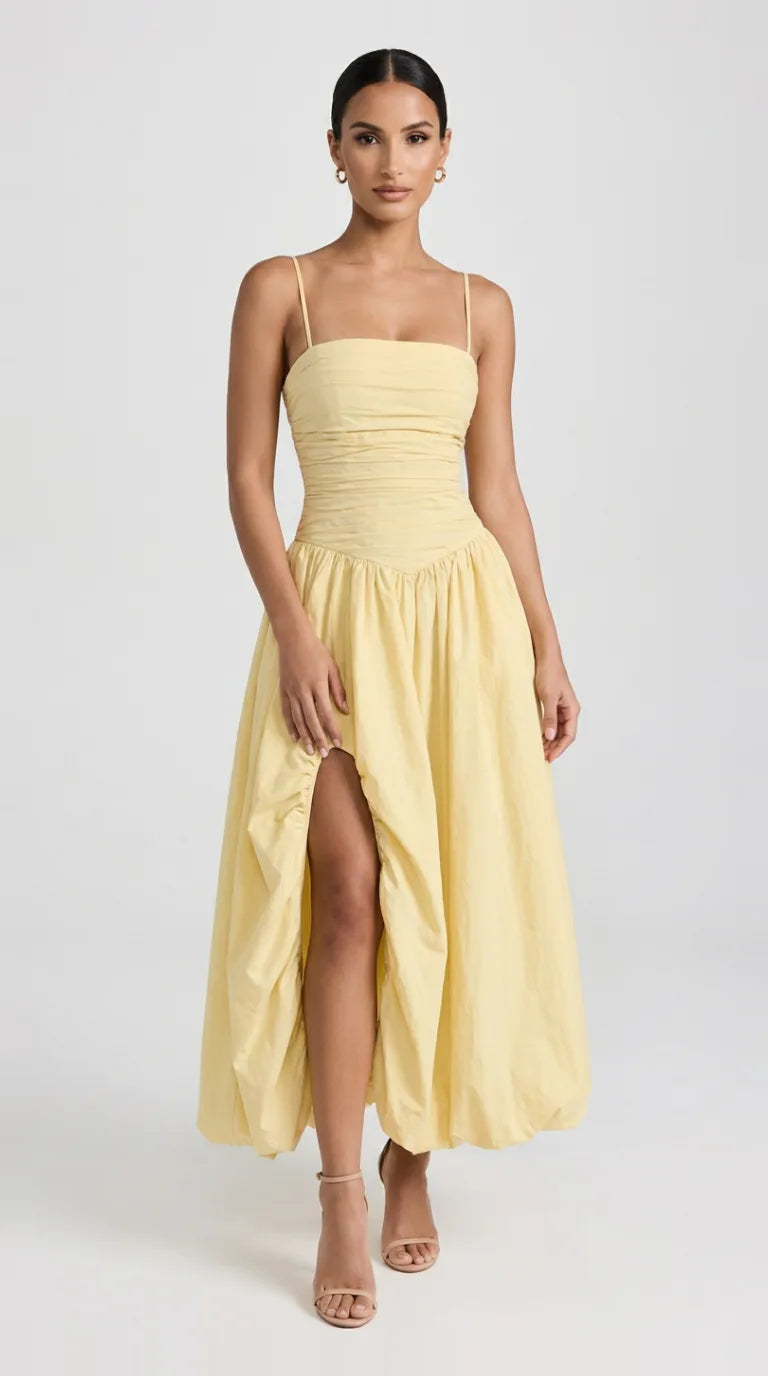 Cream yellow bubble hem midi dress with ruched bodice and front slit for women, front view of the Odette Bubble Midi Dress – Cream Yellow by ELLA Toronto in a light grey studio