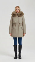 Women's khaki long parka with faux fur hood and drawstring waist by ELLA Toronto, front view
