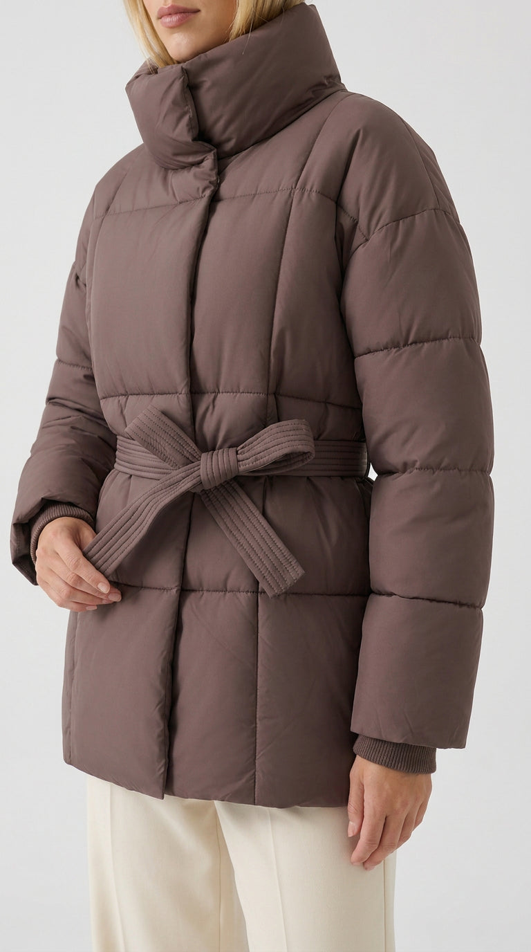 Coffee brown women's puffer jacket with tie belt, side view showing the cinched waist and mid-length cut