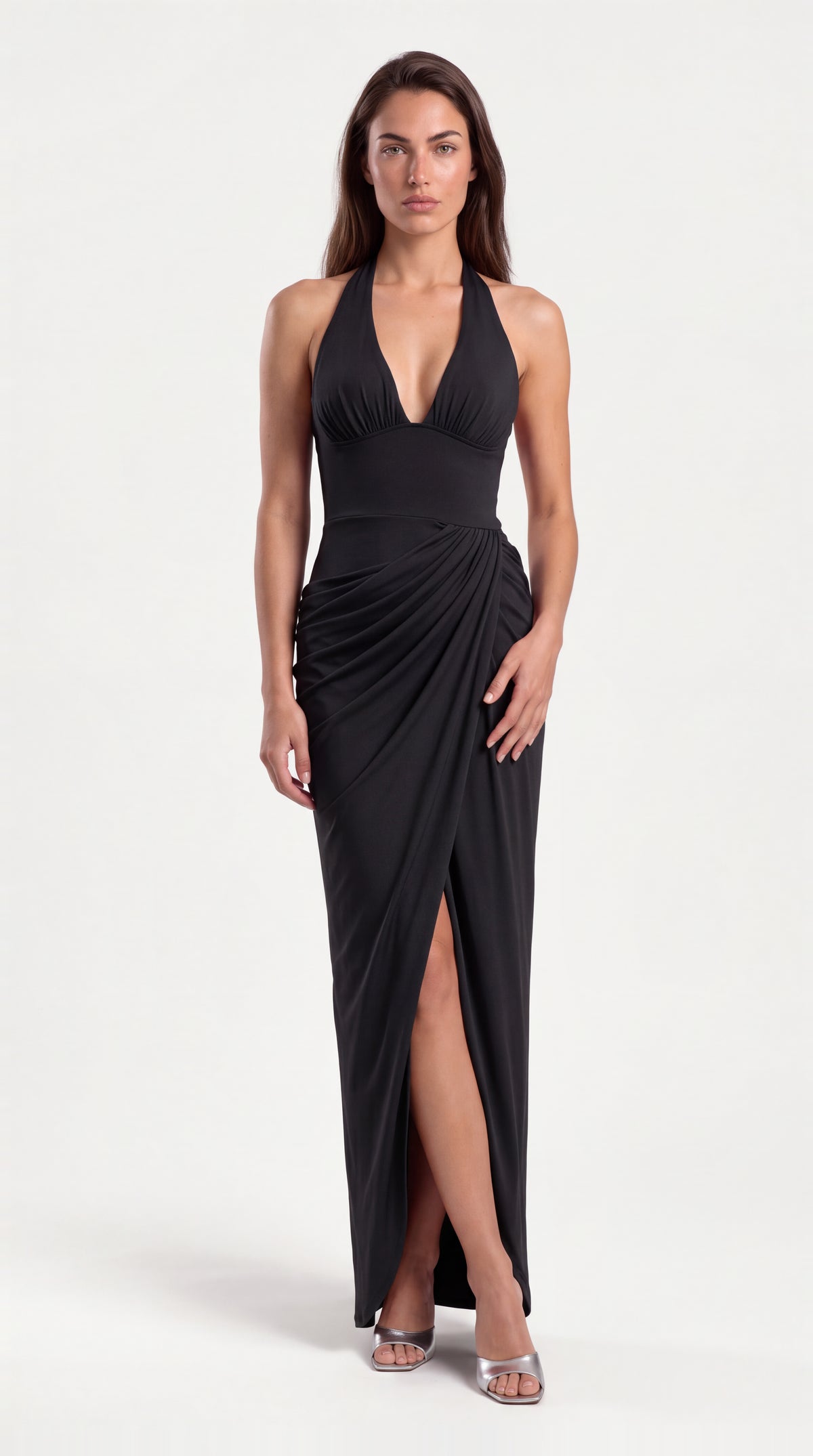 Black halter draped maxi dress for women, front view of the Vivienne Halter Draped Maxi Dress – Black by ELLA Toronto in a light grey studio