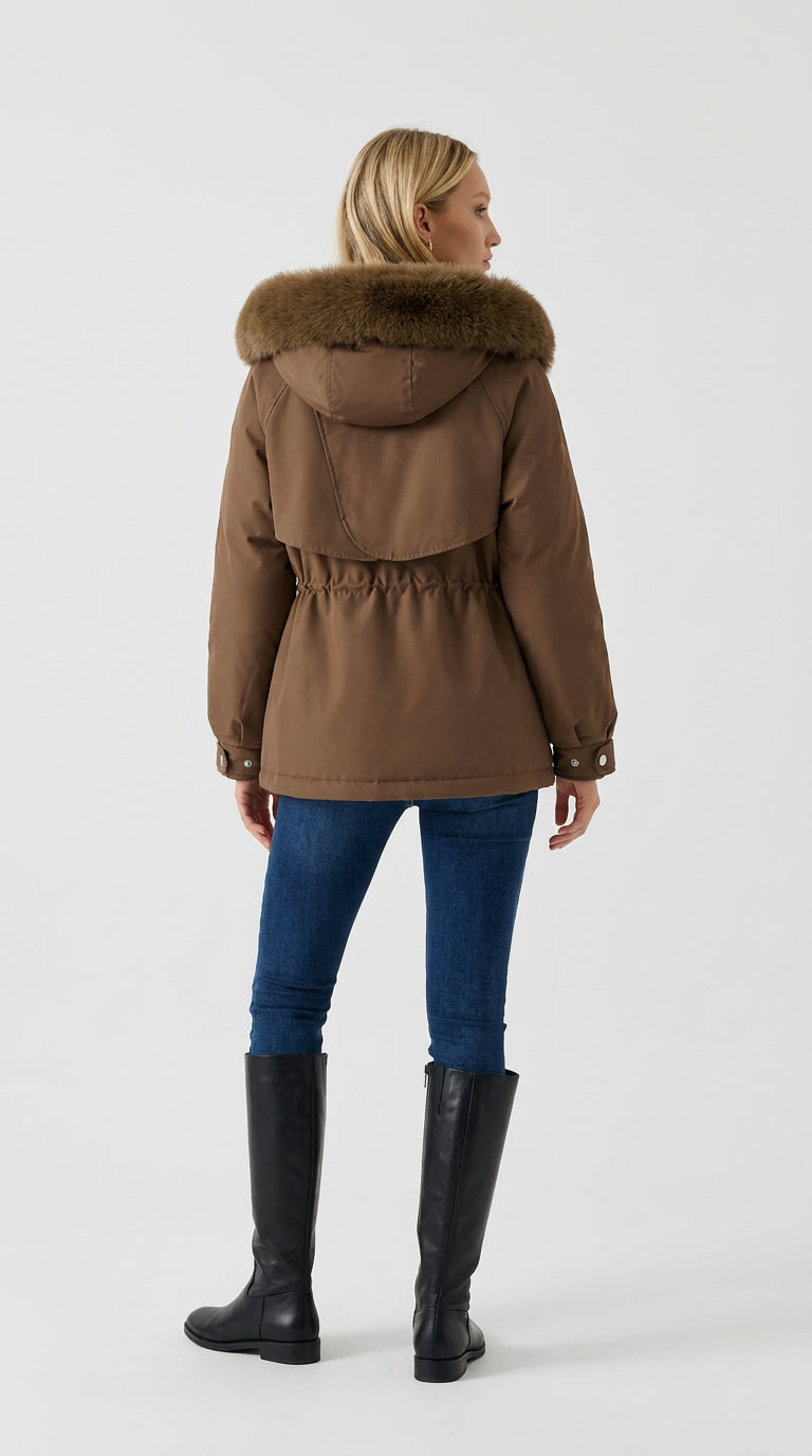 Back view of a brown faux fur hooded parka for women, showing the hood, cinched waist and snap cuffs